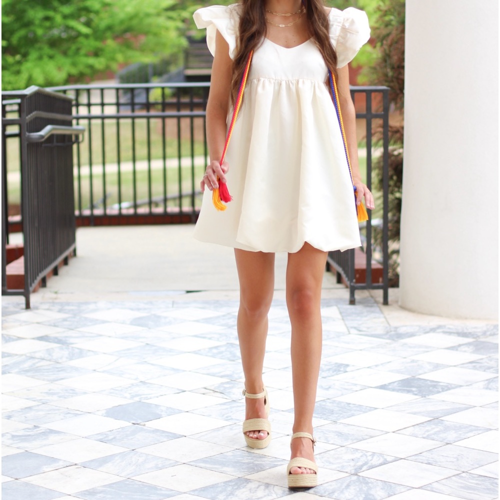 Cream/white babydoll dress! Wore this once for college graduation photos.